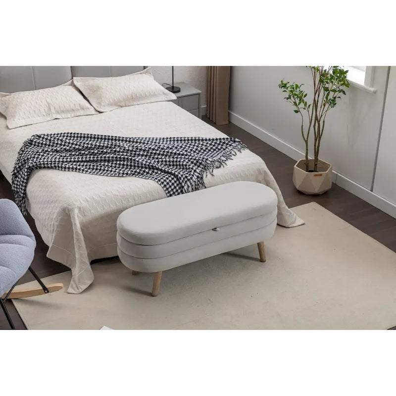 Banc de rangement en velours avec pieds en bois