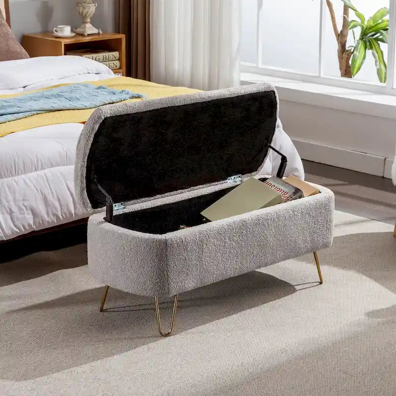 Banc de rangement en fausse fourrure grise avec pieds dorés
